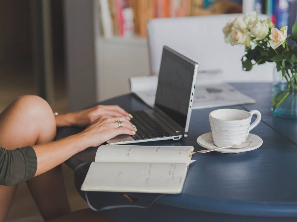 Person Using Black and Silver Laptop Computer