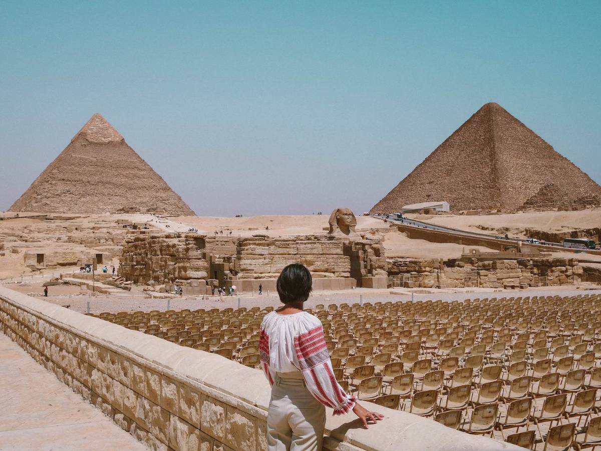 Woman Looking At Pyramids