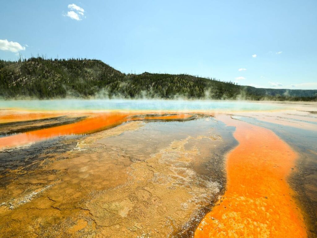 Body of Water Surrounded by Mountains
