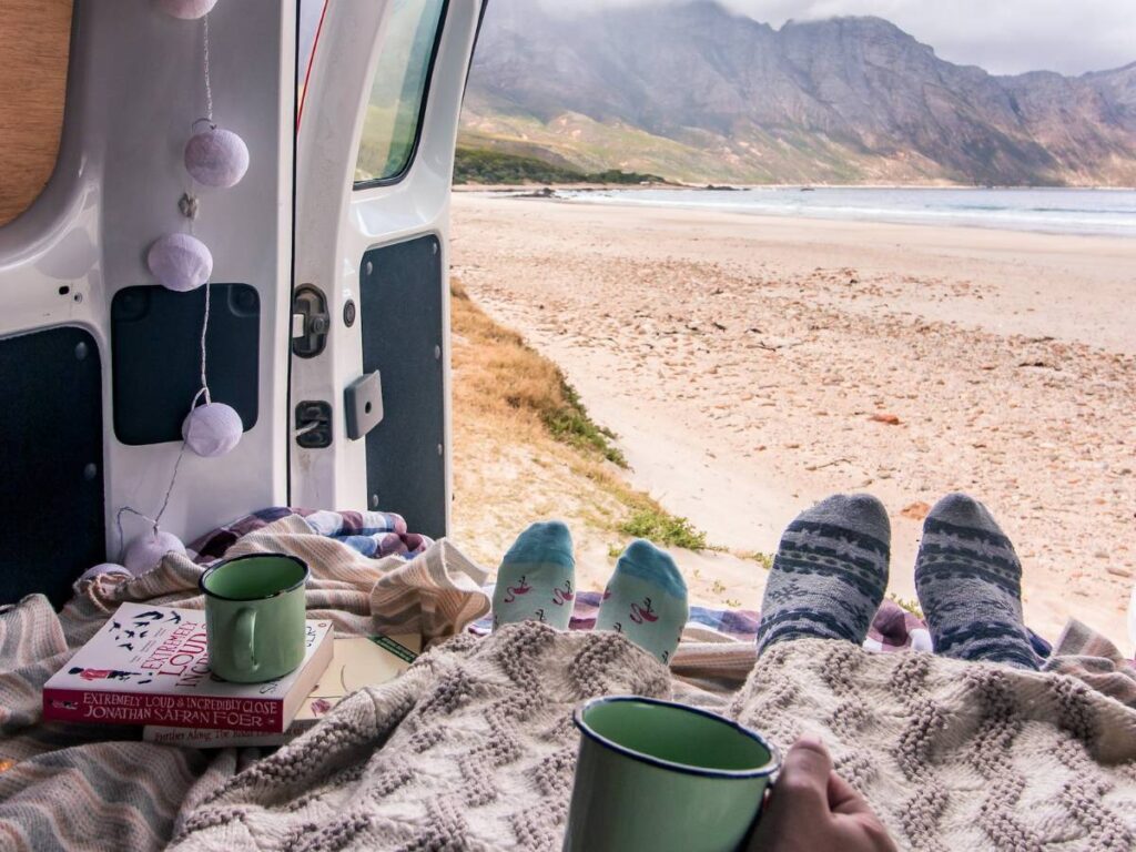 A Couple Sitting in the Campervan