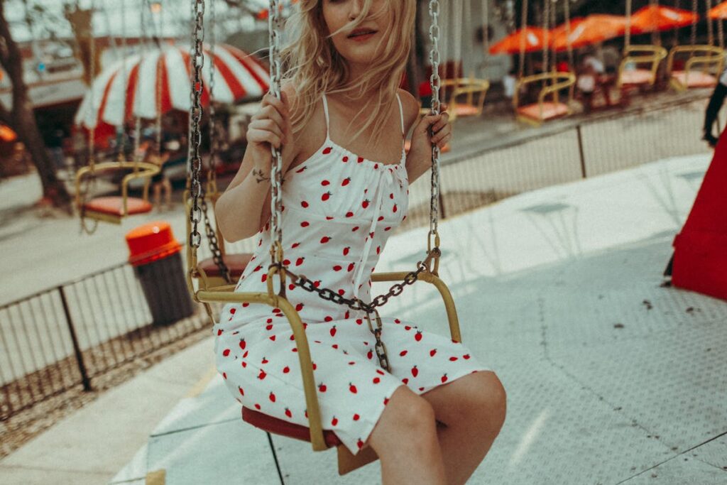 Young Woman on Ride in Entertainment Park