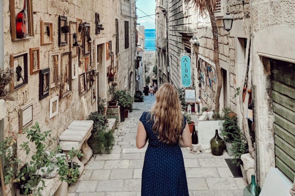 Woman in Dress in Narrow Alley in Dubrovnik