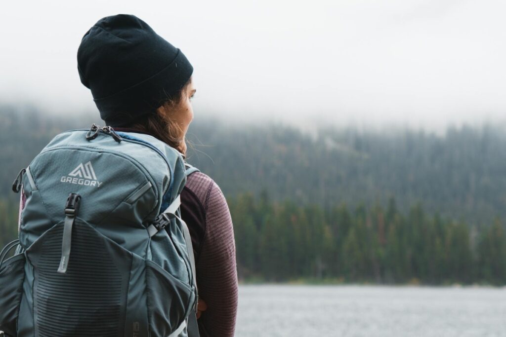 Close-up Photography of Woman Carrying Gray Backpack